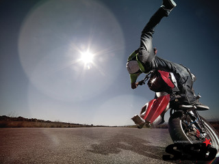Motorcycle trick person hands air - their hands in free wallpaper