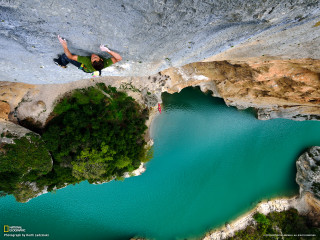 Man jumping cliff lake paraglider - charles angrand free wallpaper