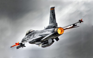 Fighterjet cloudy sky orange lights - nose free wallpaper