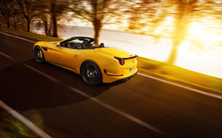 Yellow sports car driving road 5 - a road next free wallpaper