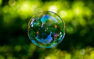 Soap bubble floating trees blurry - the background and a blurry background free wallpaper