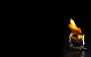 Glass flame table black background - candle free wallpaper