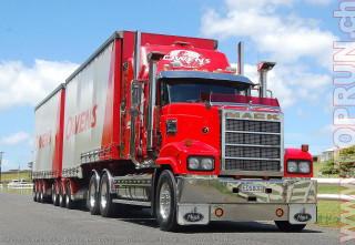 Red truck driving road sky - a red truck free wallpaper for desktop