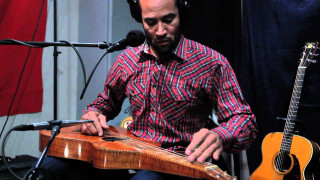 Man sitting microphone guitar headphones - david lazar free wallpaper for desktop