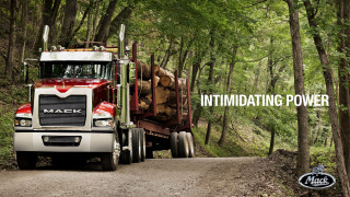 Truck driving dirt road woods - free cars wallpaper for desktop