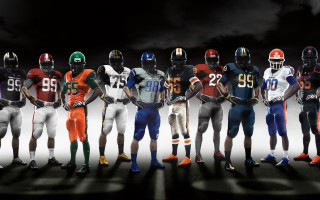 Football players standing line uniforms - a group of football players free wallpaper
