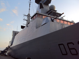 Large boat docked dock building - a large boat free wallpaper