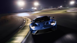 Blue sports car night track - a track free wallpaper