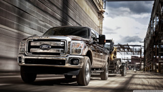 Truck driving street building construction - a street next free wallpaper