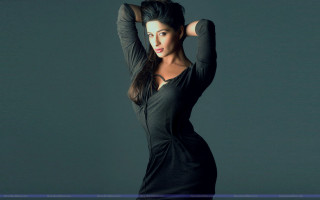 Woman black dress posing hands 6 - a ponytail free wallpaper