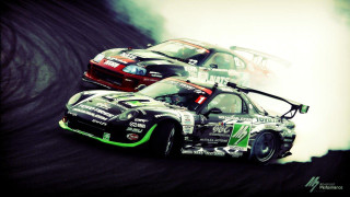 Racing cars smoke track action - two car free wallpaper
