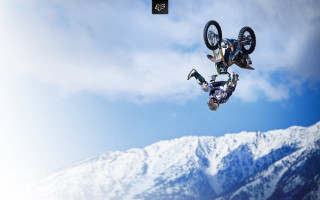 Bike trick air mountain range - mountain in the background free wallpaper