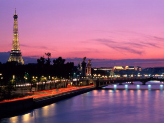 City bridge tower night lights - the water and a bridge in the foreground free wallpaper