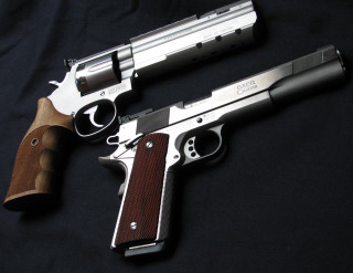 Two guns black background wooden - 30mm free wallpaper