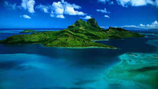 Small island water clouds plane 5 - a small island free wallpaper for desktop