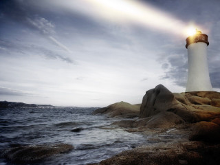 Lighthouse rocky shore cloudy sky 10 - a light beam free wallpaper