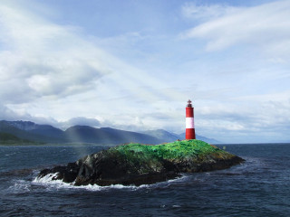 Red white lighthouse island ocean - david inshaw free wallpaper