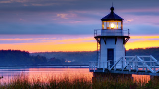 Lighthouse sunset water dock light - radiant light free wallpaper for desktop