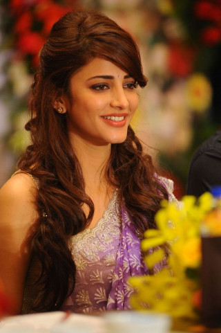 Woman smiling table flower arrangement - free happy birthday wallpaper