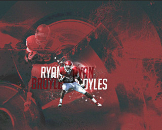Football player running ball helmet 6 - his hand and a helmet free wallpaper