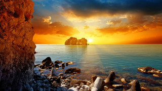 Sunset rocky beach rock formation 2 - a rock formation free wallpaper