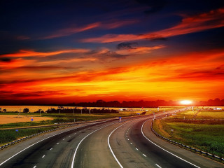 Sunset highway redsky clouds bridge - a highway free wallpaper