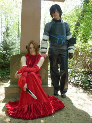 Woman red dress man costume - free hearts wallpaper for mobile