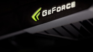 Black white geforce device closeup - a green arrow free wallpaper
