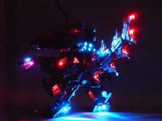 Toy robot lights dark background - cyberpunk art free wallpaper for desktop