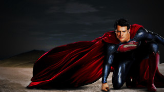 Man superman costume kneeling sand - a cape free wallpaper
