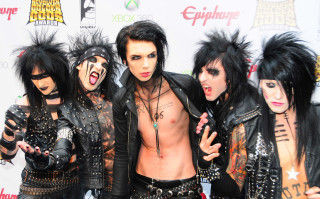 Men black hair makeup posing - a white wall free wallpaper for desktop