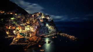 Night village cliff ocean boats - evgeny lushpin free wallpaper
