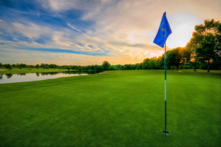 Blue flag golf course lake - a lake in the background free wallpaper
