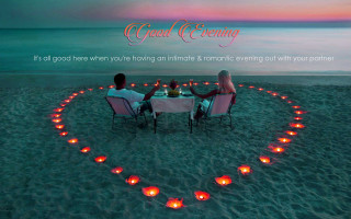 Couple beach table candles heart - a couple sitting free wallpaper
