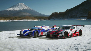 Race cars snowy lake mountain - free cars wallpaper