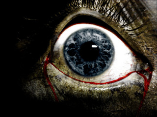 Close up eye blood drip - a close up of a persons eye free wallpaper for desktop