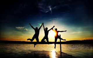 People jumping dock sunset silhouette 2 - cheerful free wallpaper