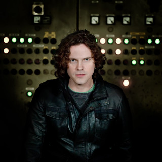 Man black jacket control panel - private press free wallpaper for tablet