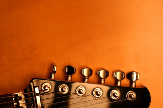 Guitar neck knobs yellow wall - a yellow wall behind free wallpaper