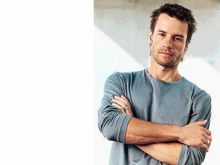 Man arms crossed serious expression - eric dinyer free wallpaper