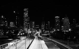 Black white city night train 2 - photo of a city free wallpaper