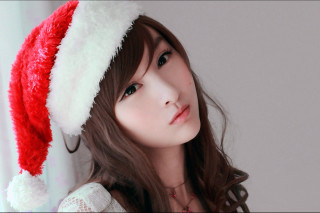 Woman santa hat long hair - a santa hat free wallpaper