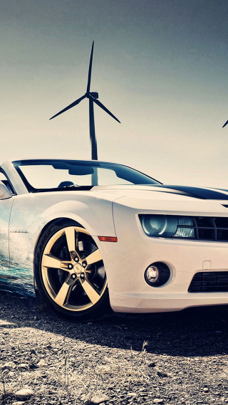 White car wind turbine farm - a white car free wallpaper for mobile