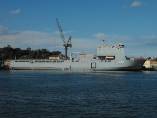 Large ship docked water crane - a crane free wallpaper