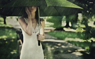 Woman holding umbrella rain park - an umbrella in the rain free wallpaper
