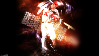 Baseball player holding bat ball - a baseball player free wallpaper
