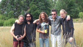 Men group standing field grass 3 - erwin bowien free wallpaper