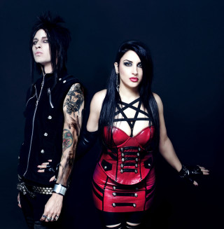 Man woman leather outfits posing - a man and a woman free wallpaper for tablet