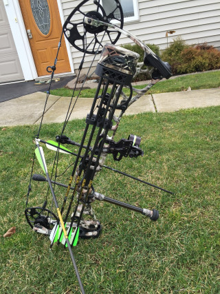 Bow rack bow arrows grass - free motorcycles wallpaper for mobile