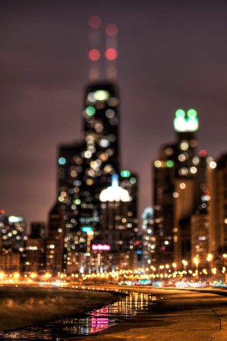 City skyline night lights reflection - free city wallpaper for mobile
